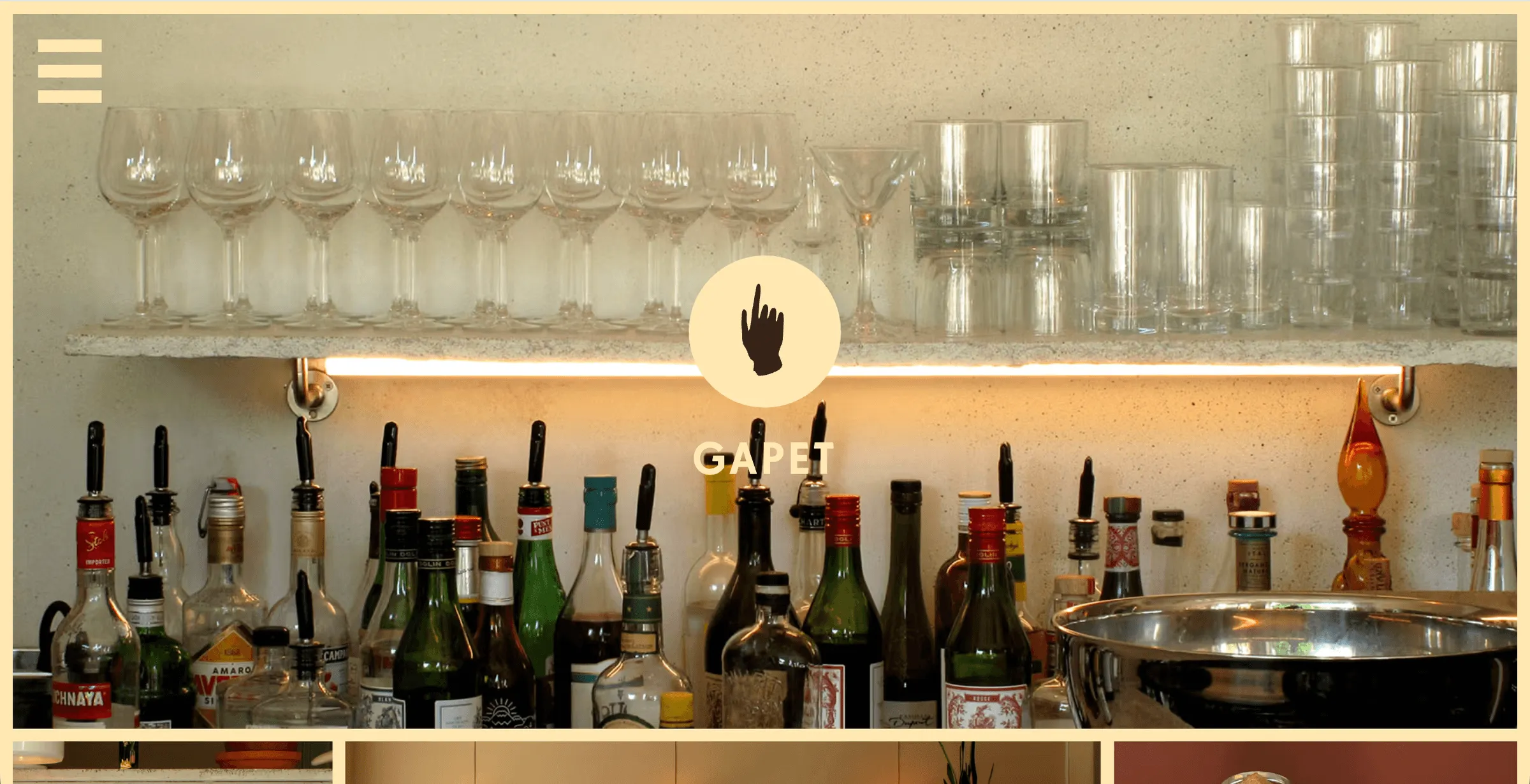 GAPET website hero with a hand icon over a shelf of glasses and rows of liquor bottles under warm light